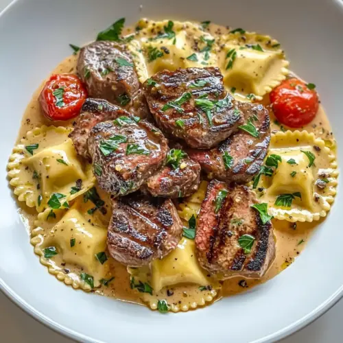Steak and Ravioli with Creamy Garlic Herb Sauce
